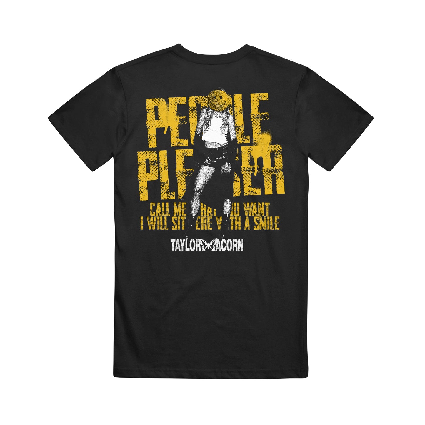 Taylor Acorn black t-shirt featuring a graphic of a person in a yellow beanie, shorts, and black shoes. Bold yellow "PEOPLE PLEASER" text with smaller white: "Call me what you want, I will sit here with a smile." A true fashion statement.