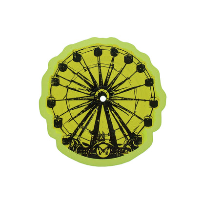 A round, yellow Ferris Wheel Vinyl by Taylor Acorn features a black Ferris wheel illustration, a scalloped edge, and a center hole—its playful design evokes the charm of a theme park when viewed from the front.